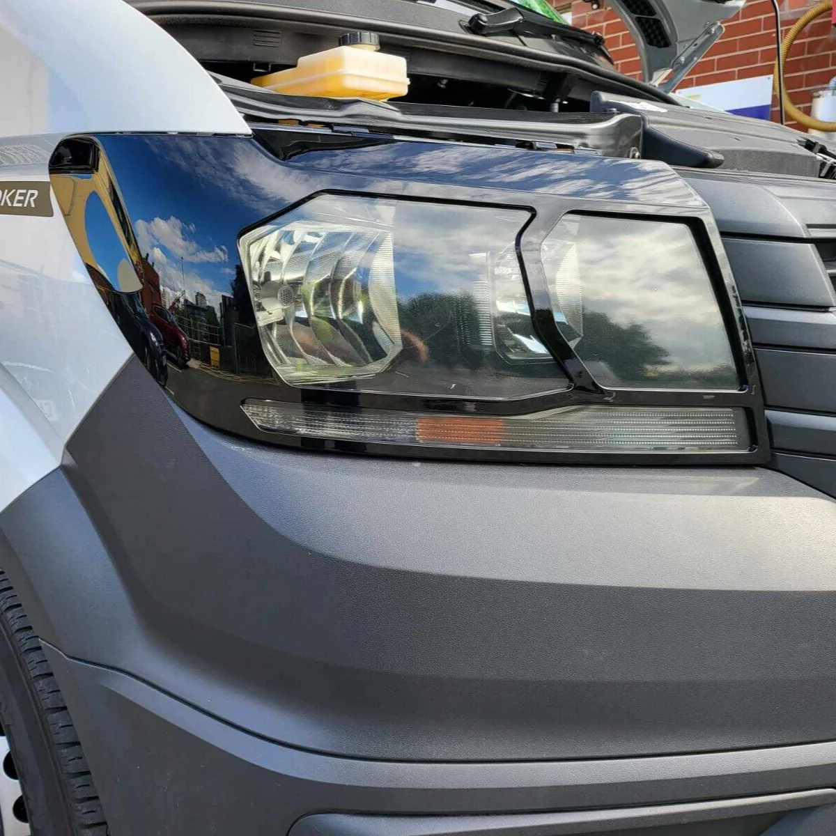 Voor MAN TGE koplampkappen – Glanzend zwart – Premium bescherming | Van-X