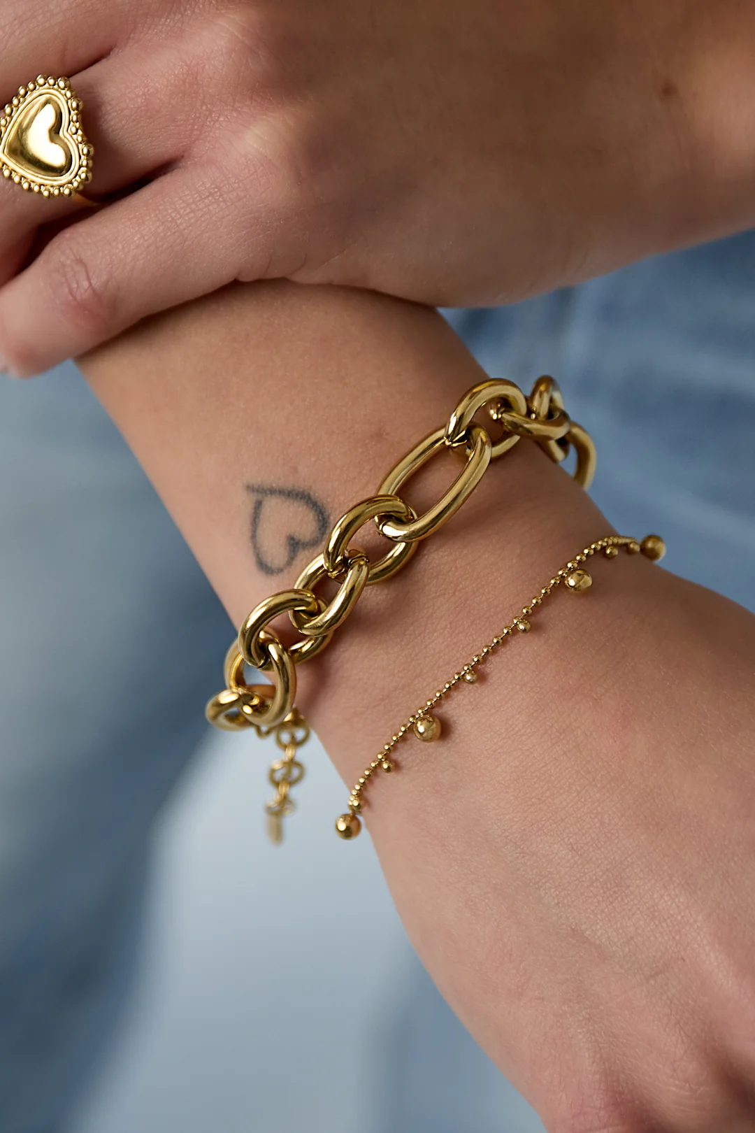Armband met afwisselende bolletjes