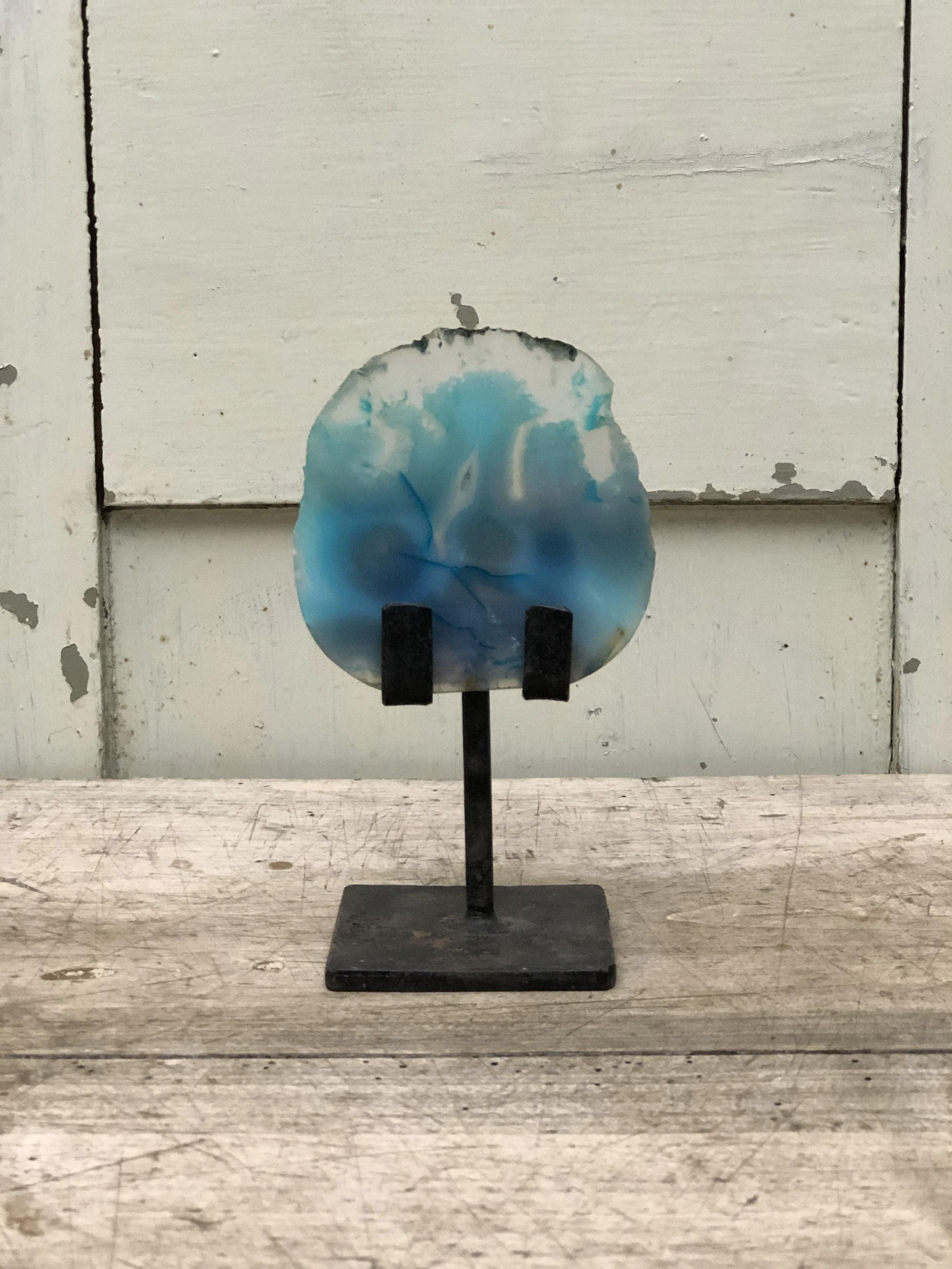 Edelsteen blauw op voet