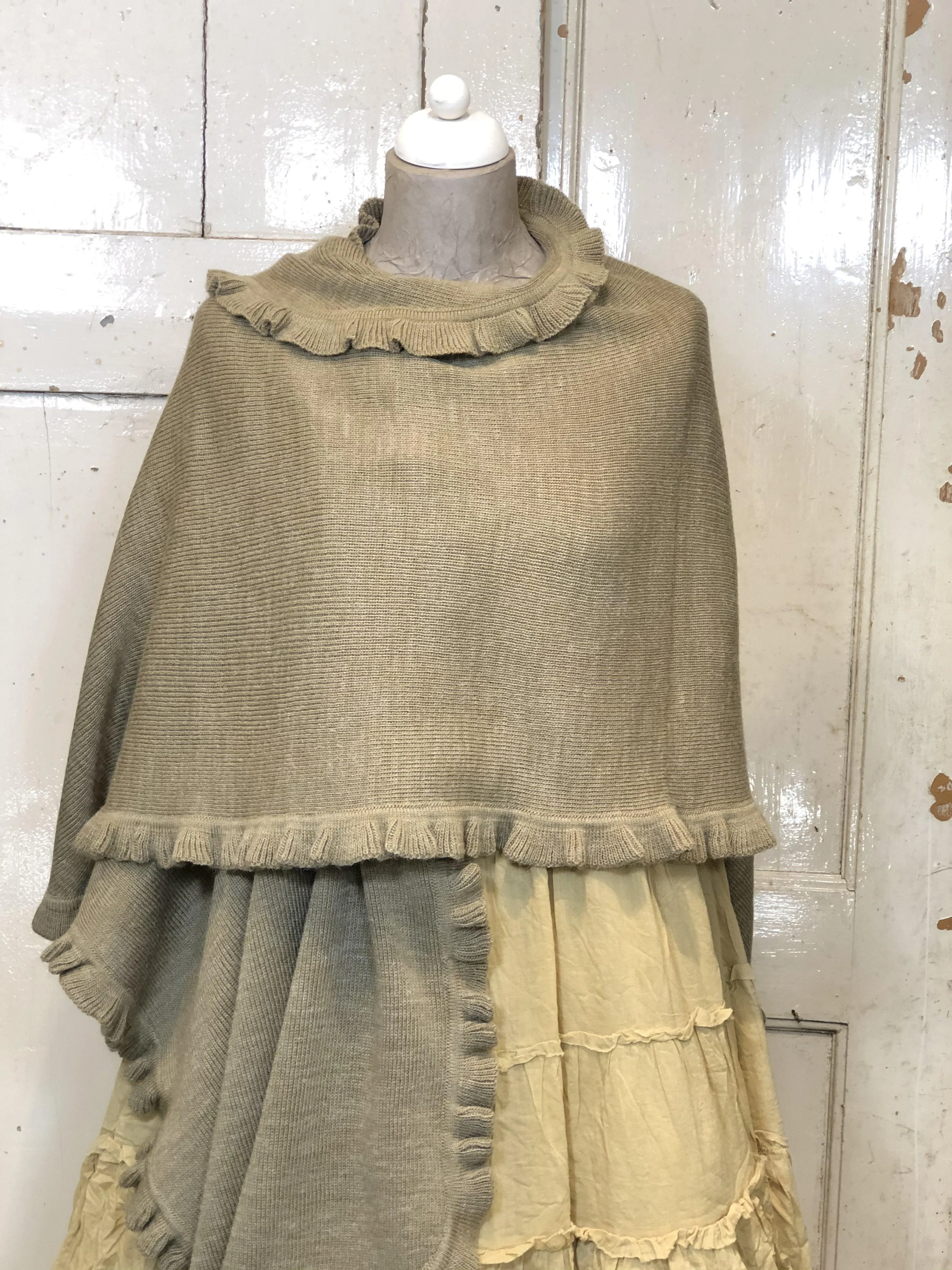 Poncho met randje Alpaca Sand