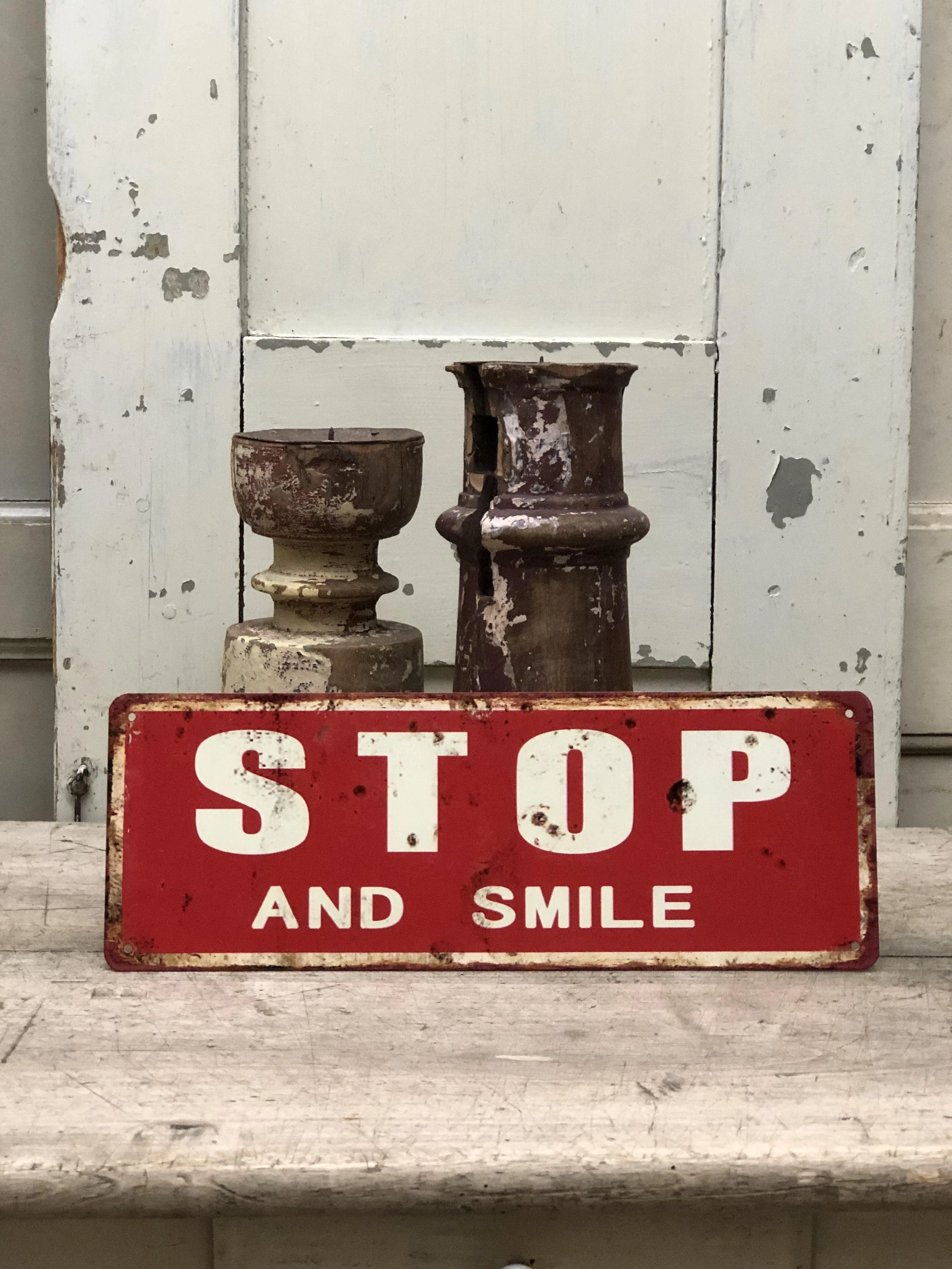 Metalen board ,,Stop and smile”