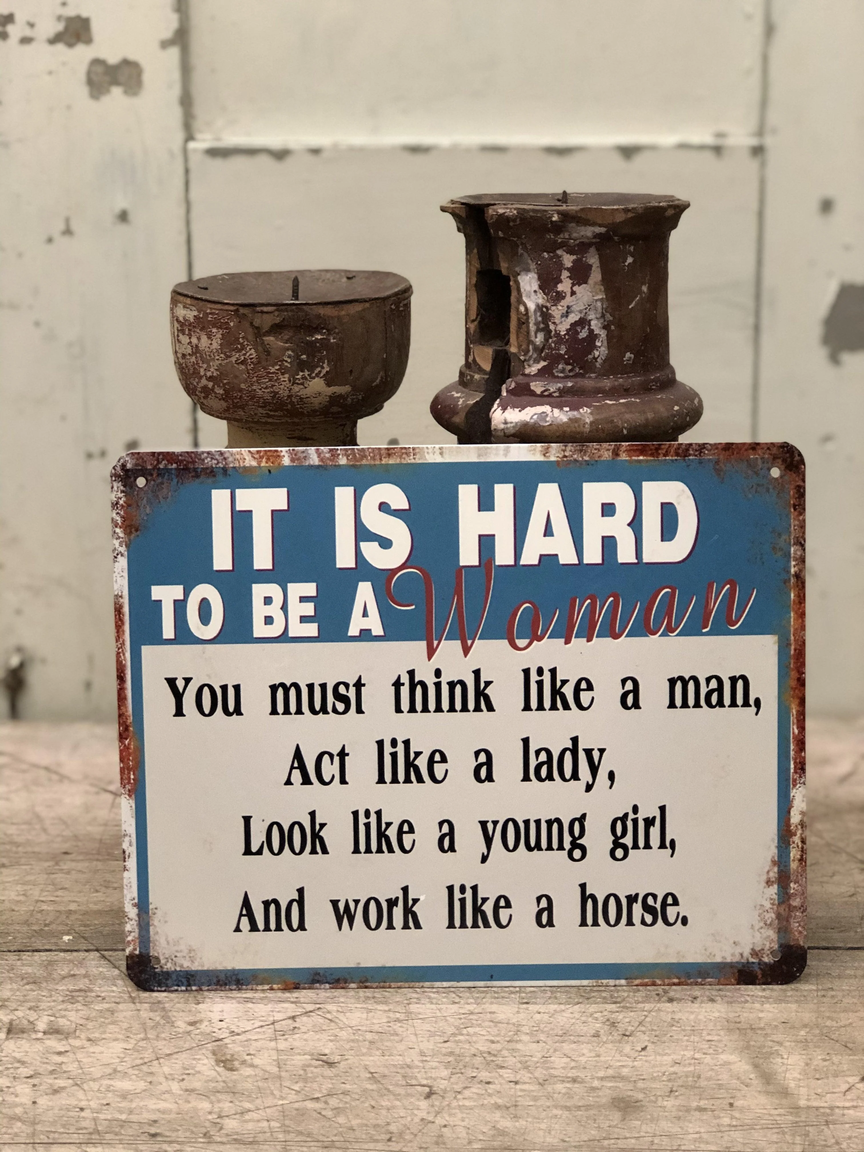 Metaal board ,,it is hard to be a women”
